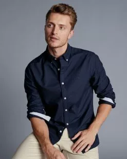 CHARLES TYRWHITT Button-Down Collar Washed Oxford Shirt - Navy B -Charles Tyrwhitt Shop CSR2036NAV MODEL SEATED