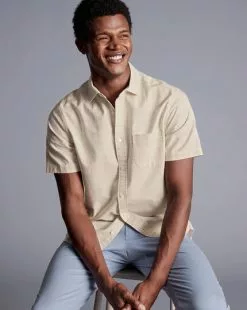 CHARLES TYRWHITT Cotton Linen Check Short Sleeve Shirt - Oatm -Charles Tyrwhitt Shop CSR2063OAT MODEL SEATED
