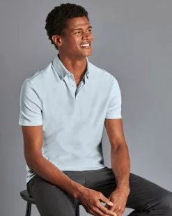 CHARLES TYRWHITT Combed Cotton Polo - Cornflower B -Charles Tyrwhitt Shop JEP0390CFW MODEL SEATED