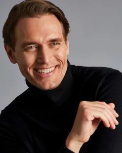 CHARLES TYRWHITT Merino Roll Neck Sweater - Black -Charles Tyrwhitt Shop KNJ0070BLK MODEL DETAIL