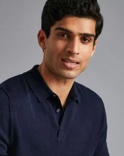 CHARLES TYRWHITT Merino Short Sleeve Polo Sweater - Navy 10 CHARLES TYRWHITT Merino Short Sleeve Polo Sweater - Navy -Charles Tyrwhitt Shop KNJ0420NAV MODEL DETAIL