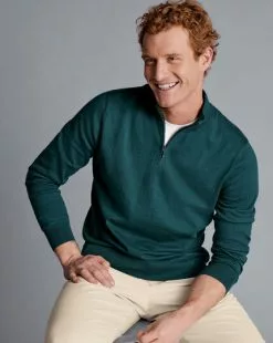 CHARLES TYRWHITT Combed Cotton Zip Neck Sweater - Teal Green -Charles Tyrwhitt Shop KNJ0440TEL MODEL SEATED